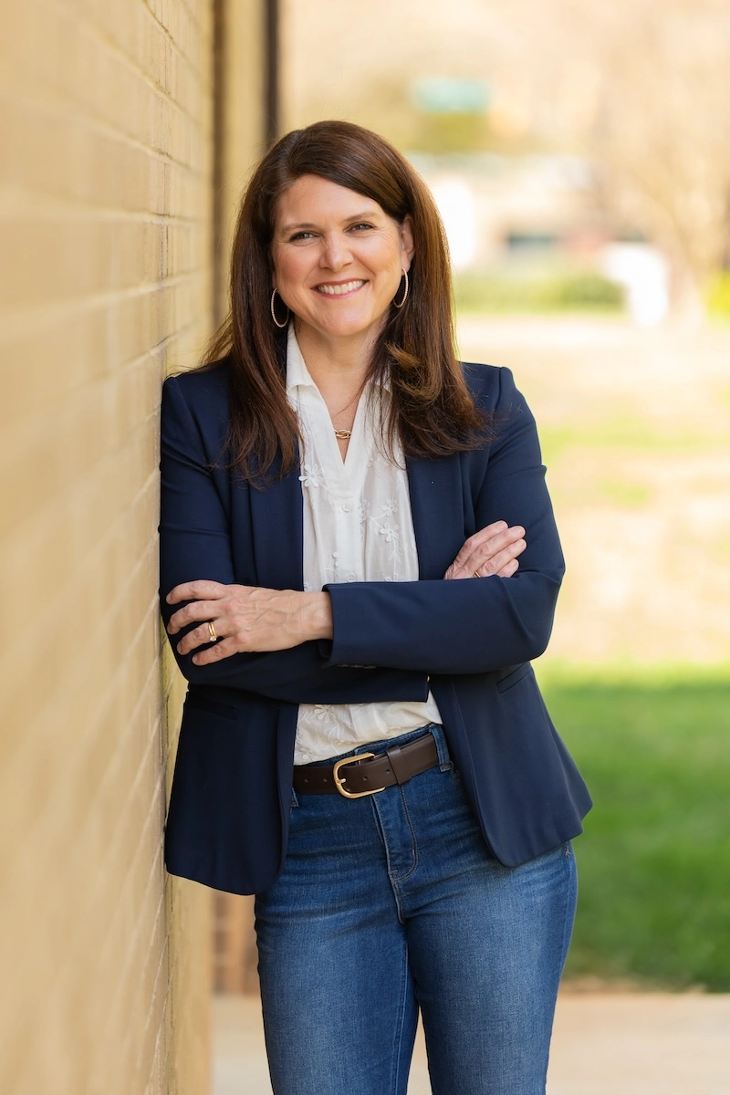 Melissa B. Kruger smiling outdoors